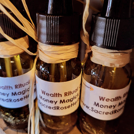 wealth alchemy ritual oil money magick anointing oil sacred rose herb & root magickal